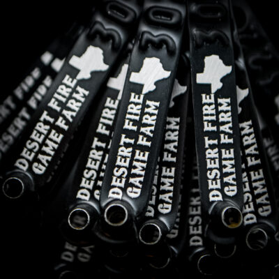 Black custom engraved leg bands for Desert Fire Game Farm