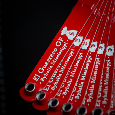 Red custom engraved leg bands for El Guerrero GF