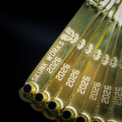 Brass custom engraved leg bands for Skunk Works 2026
